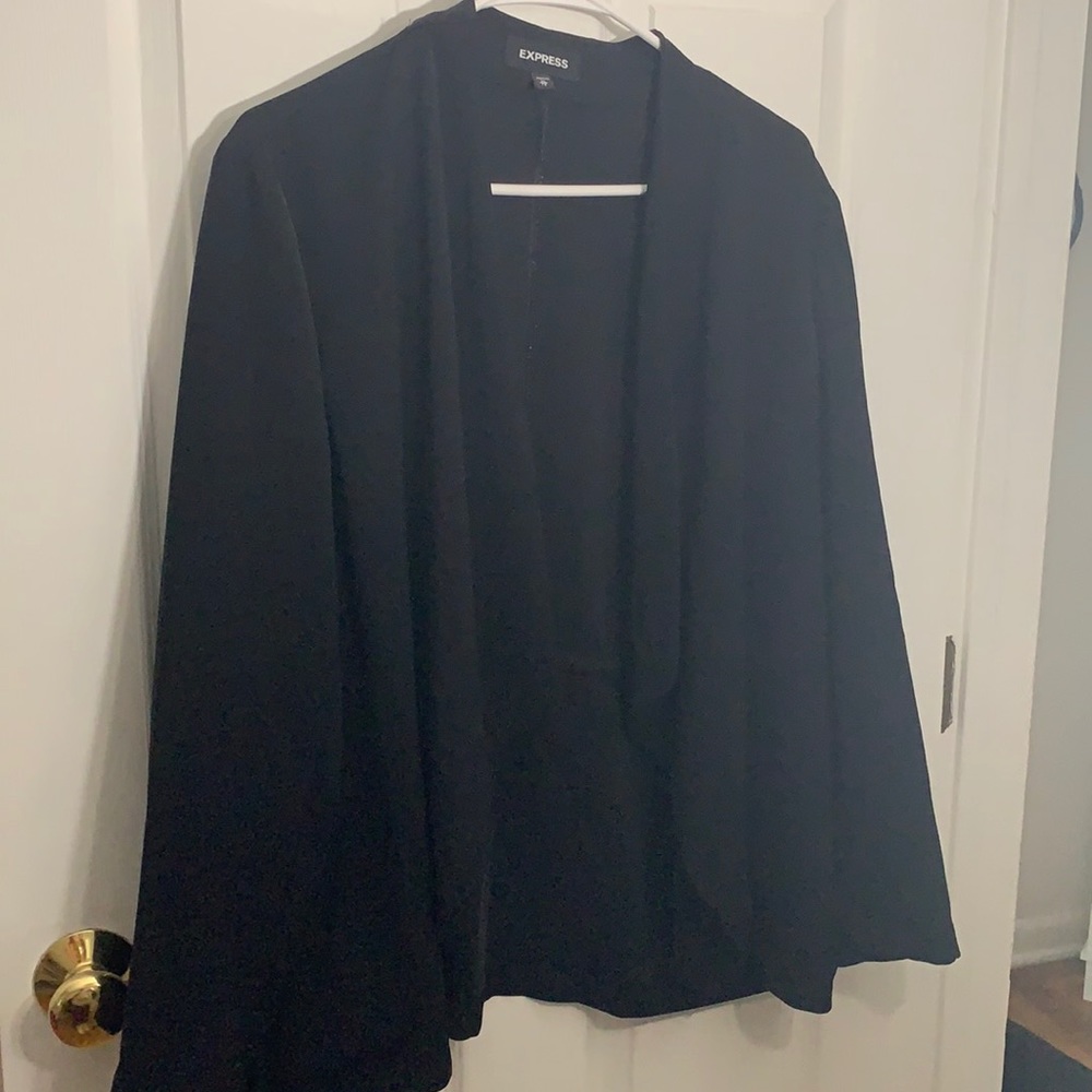 Black blazer with a drawstring around the waist area